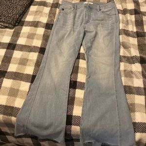 Kan can flare denim jeans with stretch. Size 13